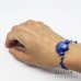 Bracciale cordino cerato con conchiglia blu