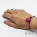 Bracciale cordino cerato con conchiglia fucsia