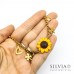 Bracciale con catenina in acciaio girasole e charms