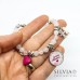 Bracciale con perle di quarzo rosa ciondolo "Grazie Maestra" e charms