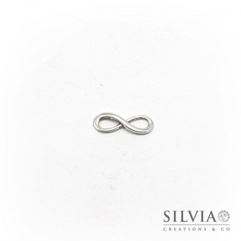 Charm a forma di simbolo infinito argento antico in zama 24x8 mm