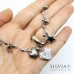 Collana catena acciaio con ciondolo cuore di cristallo e charms