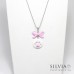 Collana lunga con zampa rosa su disco bianco e fiocco